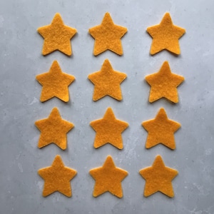 Stelle in feltro dorate, stelle in feltro fustellate, stelle di medie dimensioni