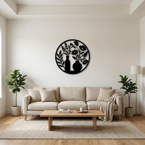 Laser cut metal wall art of two vases with wildflower bouquets inside a circle frame, hanging on a wall