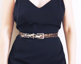 black dress with leopard print belt