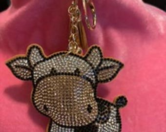 Portachiavi a tema western: ciondolo a forma di mucca con strass