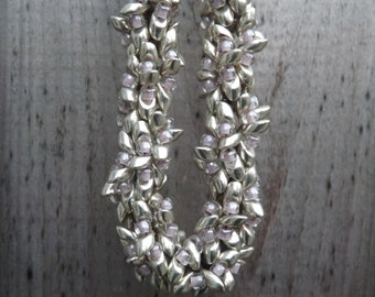 Seaside Metallic Silver, Orchid and Mauve Beaded Spiral Necklace with Silver Flower and Leaf Clasp: "Bronya"