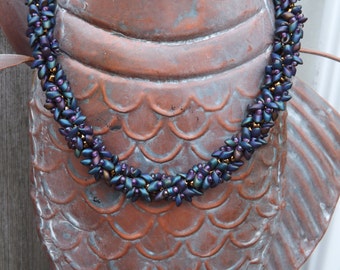 Seaside Cobalt, Violet, Sapphire, Navy, Bronze Iris Matte Beaded Spiral Necklace with Brass Leaf Toggle Clasp and Seashell Charm: "Rosaline"