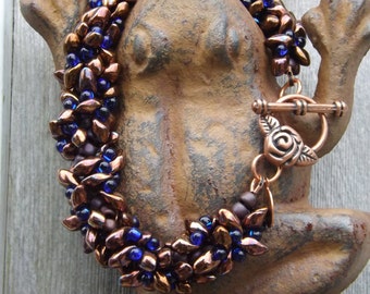 Seaside Copper, Cobalt Blue and Matte Maroon Beaded Spiral Bracelet with Copper Flower Clasp: "Coren"