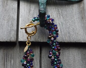 Seaside Jewel-Tone Purple Aqua Blue Gold Beaded Bracelet: "Rhea"