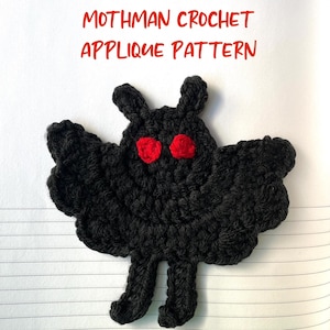 May include: Black crochet Mothman applique pattern with red eyes.