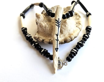 Carved antler necklaces