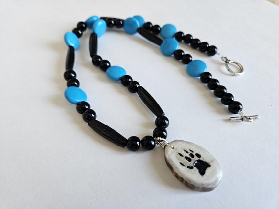 Deer antler pendant beaded necklace, hand carved wolf print, naturally shed, Native American jewelry and gifts