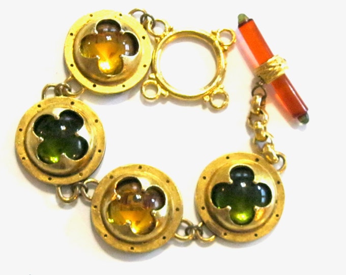 Featured listing image: Vintage Ann Egan Designer Gothic Medieval Renaissance Quatrefoil Bracelet - Matte Gold Toned Metal w Jewel Toned Lucite & Toggle Clasp