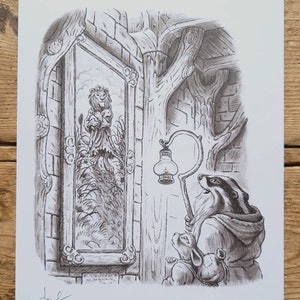 May include: A black and white illustration of a badger holding a lantern and looking at a framed picture of a lion. The picture is hanging on a wall with a tree branch above it.
