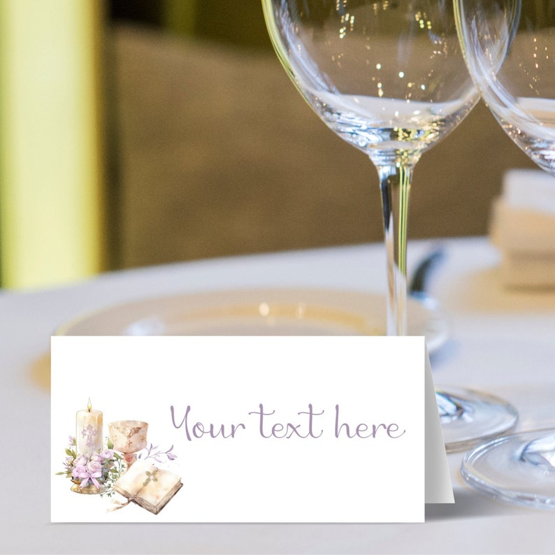 May include: White place card with a watercolor illustration of a candle, a chalice, and a book with purple flowers. The text "Your text here" is written in purple script.
