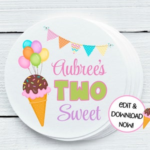 May include: A round, white sticker with a pink, green, and purple ice cream cone graphic. The sticker says "Aubree's Two Sweet" with a colorful banner above the text and balloons on the left side. A pink circle with the text "Edit & Download Now!" is in the lower right corner.