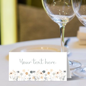 May include: White place card with a gray floral border and the text "Your text here" in gray.
