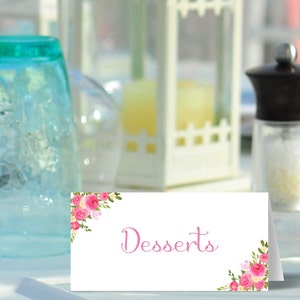 May include: White card with pink floral accents and the word "Desserts" in pink script.