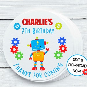 May include: Round, white favor tags with a blue robot and colorful gears. The text reads "Charlie's 7th Birthday Thanks for Coming".
