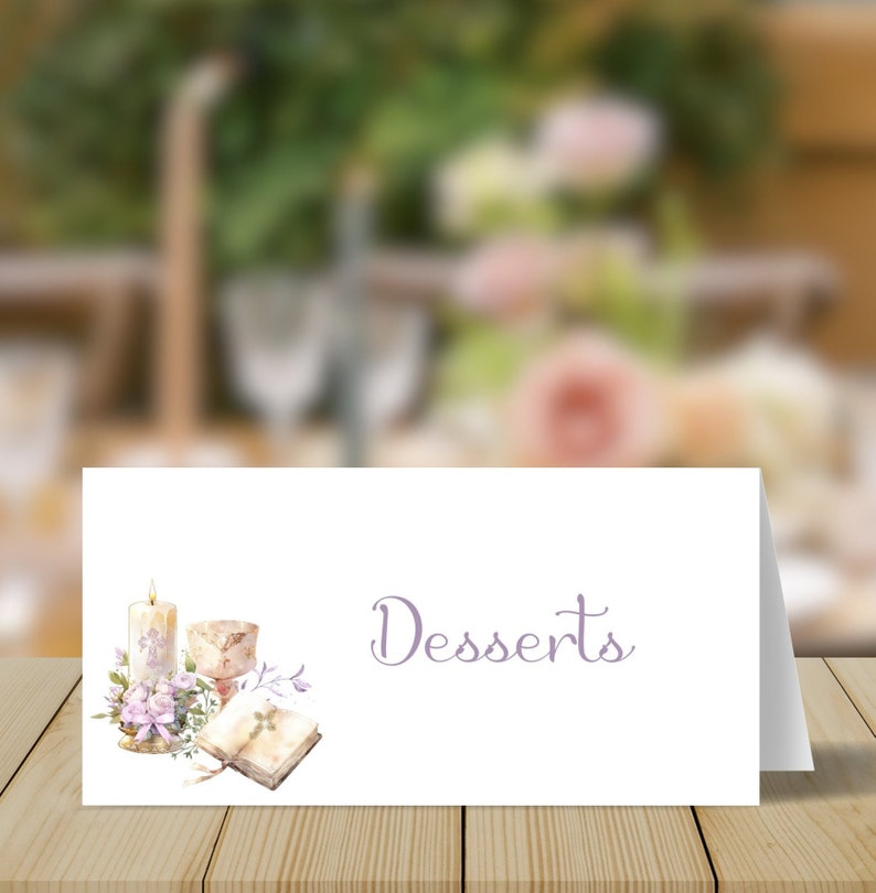 May include: White card with a purple inscription that reads "Desserts". The card is decorated with a watercolor illustration of a candle, a chalice, a book, and flowers.