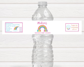 Könnte beinhalten: Wasserflaschenetikett mit einem rosafarbenen und blauen Regenbogen-Design. Das Etikett lautet "Madison's Rainbow Baby Shower" und enthält eine Wolke mit Regentropfen und den Text "Danke fürs Feiern mit uns!"