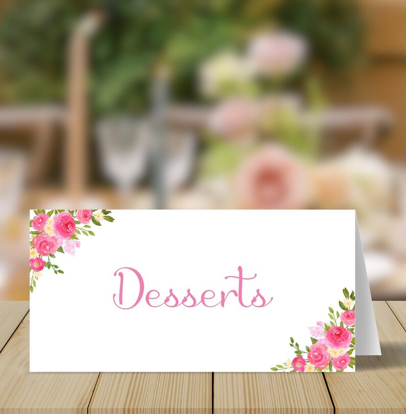 May include: A white card with pink floral borders and the word "Desserts" written in pink script.