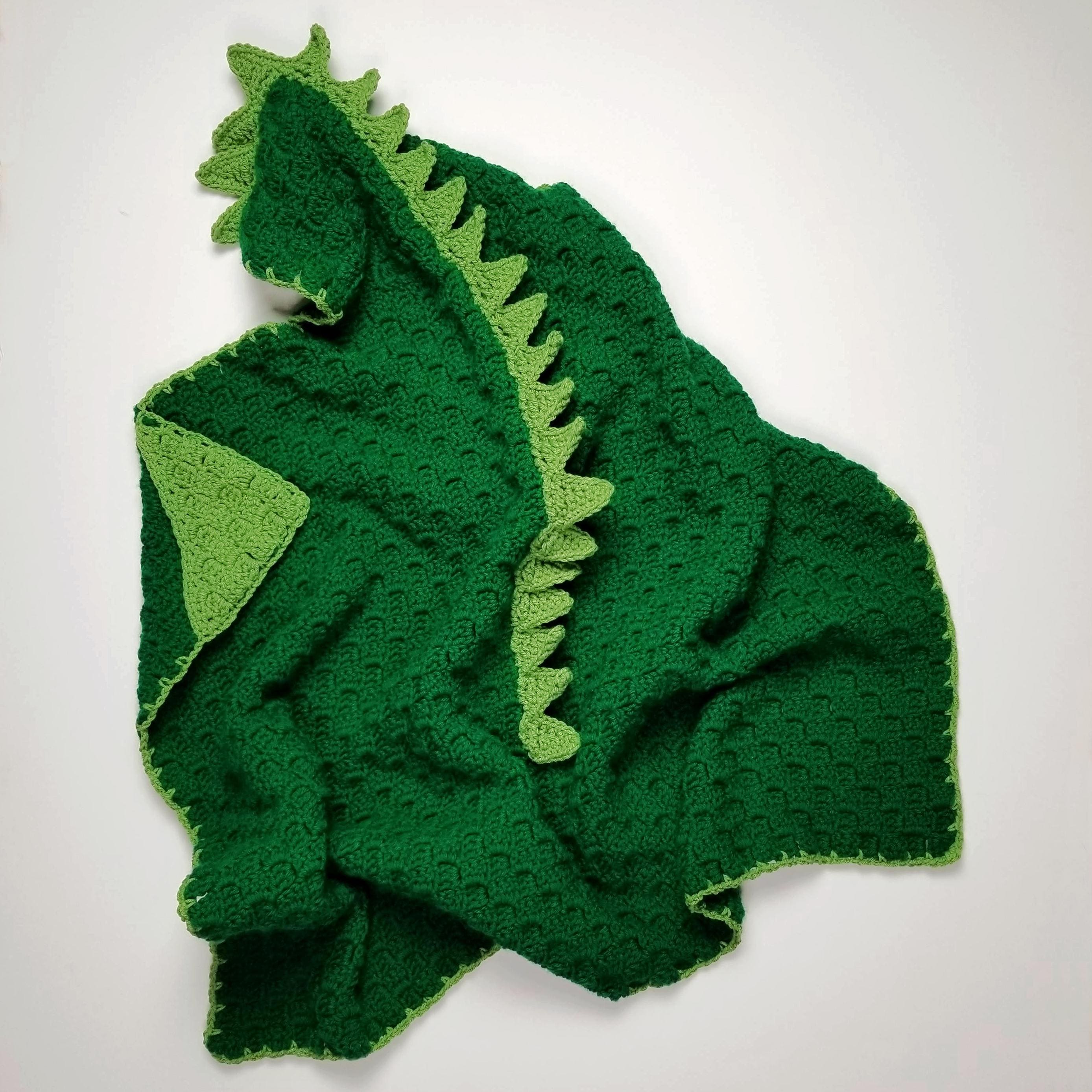 40 Dinosaur Blanket Crochet Patterns to Stitch for Kids, Nurseries, and Dino Fans 1 Cuddle Up Dinosaur Blanket Pattern Aran Yarn Easy