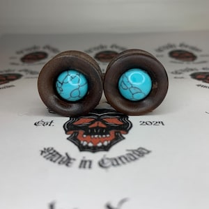 Tapones de madera de nogal negro de 22 mm con doble abocinado y incrustaciones de turquesa sintética