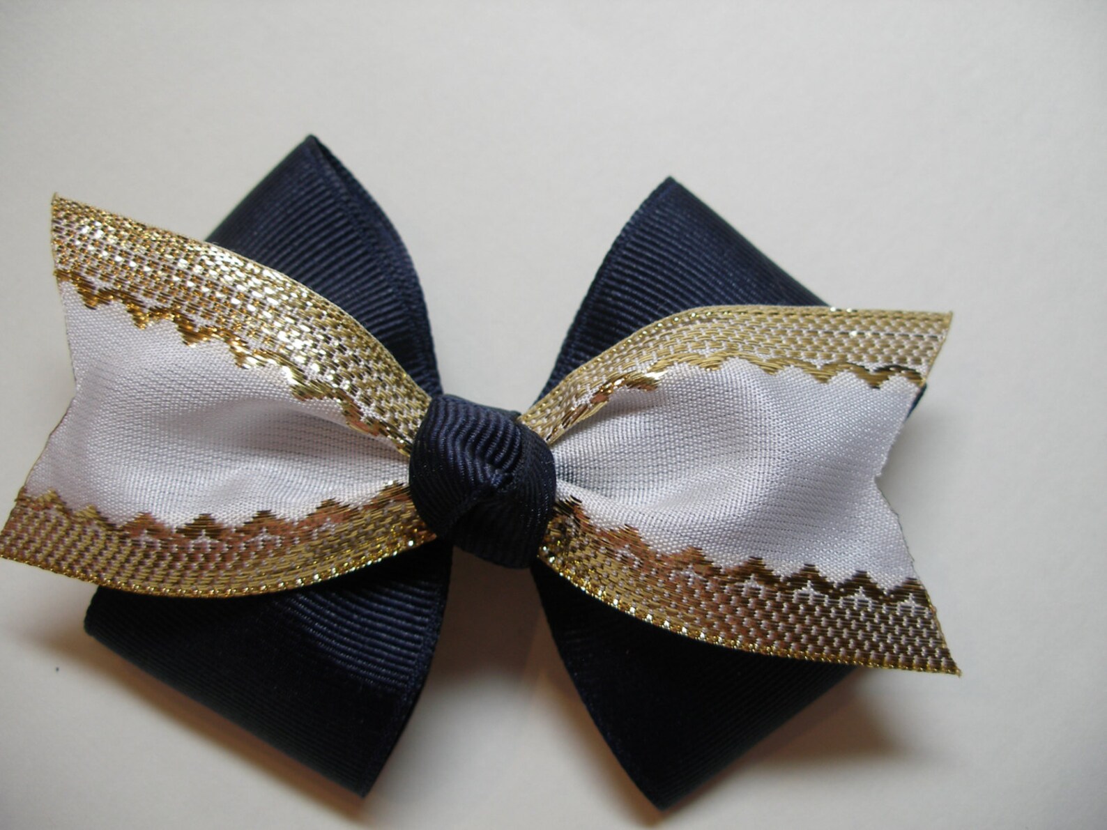 navy blue and gold hair bows