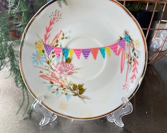 Celebration bunting a small vintage plate to help celebrate any occasion