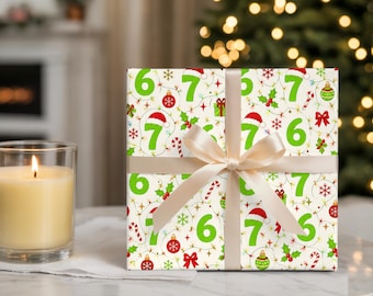 Weihnachtsgeschenkpapierrolle mit den Zahlen „6-7“