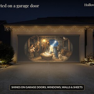 May include: A projector display showing a nativity scene on a garage door with the text Projected on a garage door, HollowlightFX, and SHINES ON GARAGE DOORS, WINDOWS, WALLS & SHEETS. The oval image depicts figures in a stable setting.