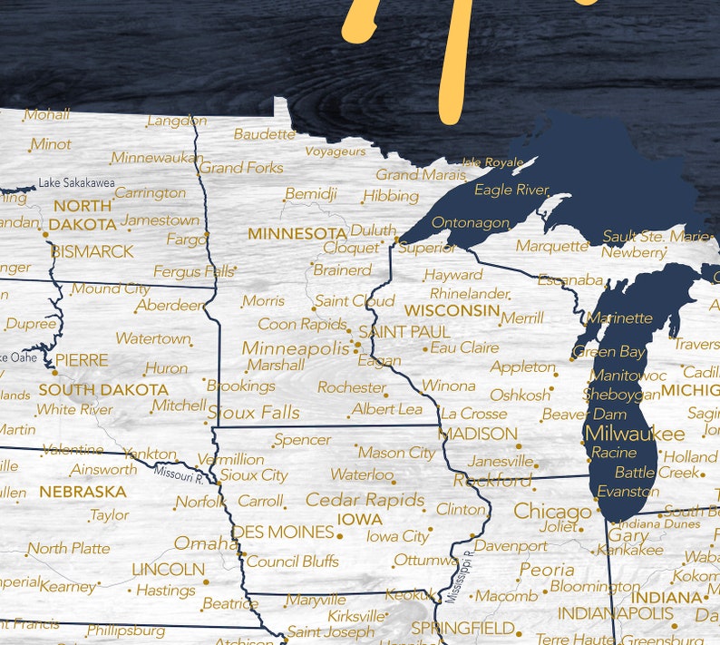 May include: A map of the Midwestern United States with state borders outlined in navy blue and city names in gold. The map is on a woodgrain background.