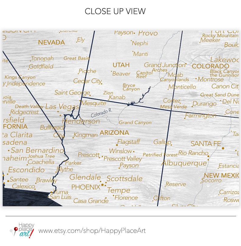 May include: A map of the southwestern United States with state borders outlined in dark blue and city names in gold. The map is printed on a wood-grain background. The map includes the states of Nevada, Utah, Arizona, Colorado, and New Mexico. The map also includes the cities of Las Vegas, Phoenix, Denver, and Santa Fe.