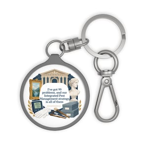 May include: A round metal keychain featuring a graphic with a classical building, a framed landscape painting, a bust, a digital hygrometer, white gloves, brushes, and storage boxes. The text reads: I've got 99 problems, and our Integrated Pest Management strategy is all of them.