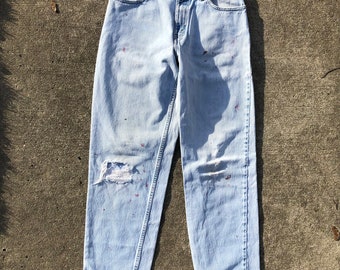 Vintage 1990s Levi Silvertab paint splatter lightwash jeans in waist 32