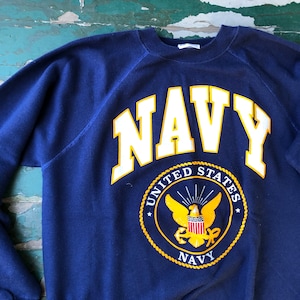 Vintage 1980s United States Navy raglan crewneck sweatshirt from Hanes