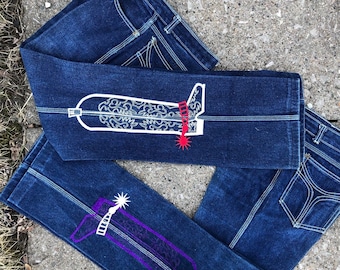 Vintage early 1980s bootcut jeans with cowboy boot embroidery in purple