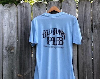 Vintage baby blue Steamboat Springs Old Town Pub paper thin tee. Free shipping