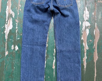 Vaqueros Levi's 501XX vintage, de pierna recta y cierre de botones.