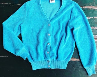 bright blue cardigan