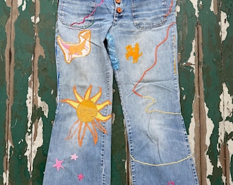 1960s vintage hand embroidered one of a kind patchwork flare leg button fly jeans