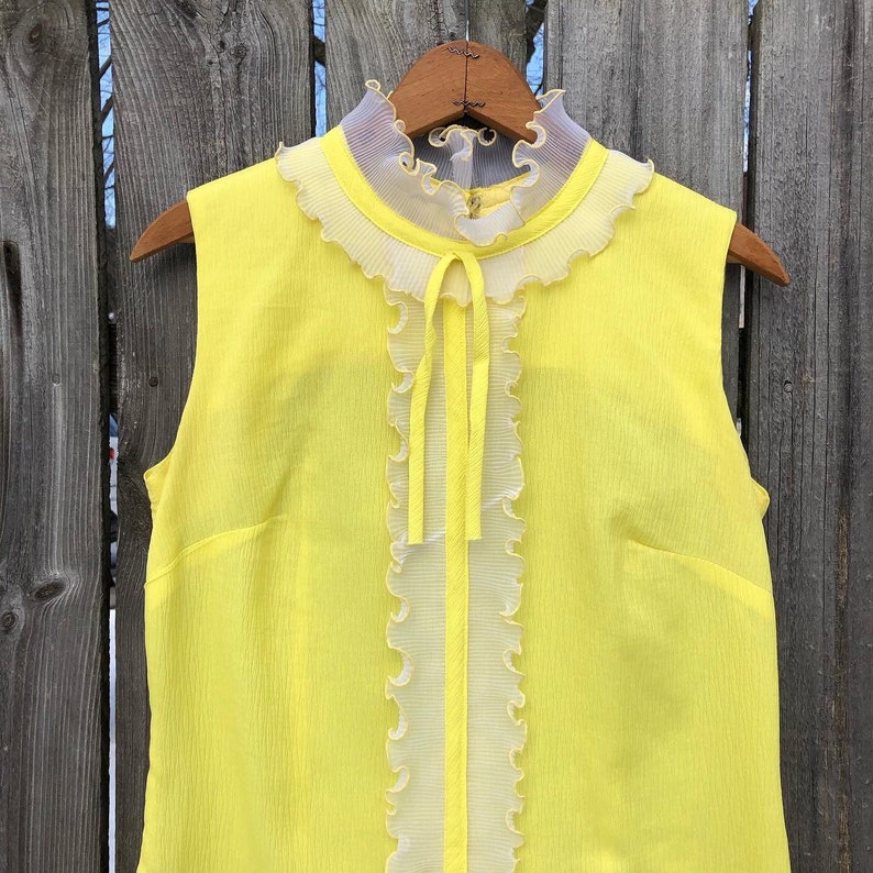 1970s yellow crepe pleated mini dress with ruffle and bow drop waist