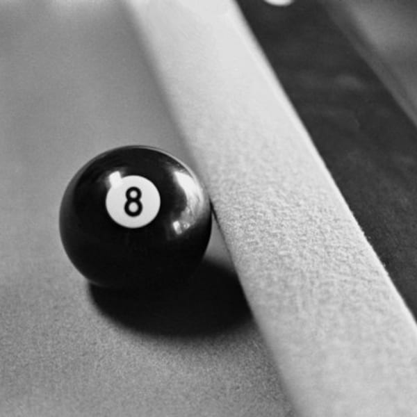 Photograph of an 8 ball on a Pool Table - Black and White