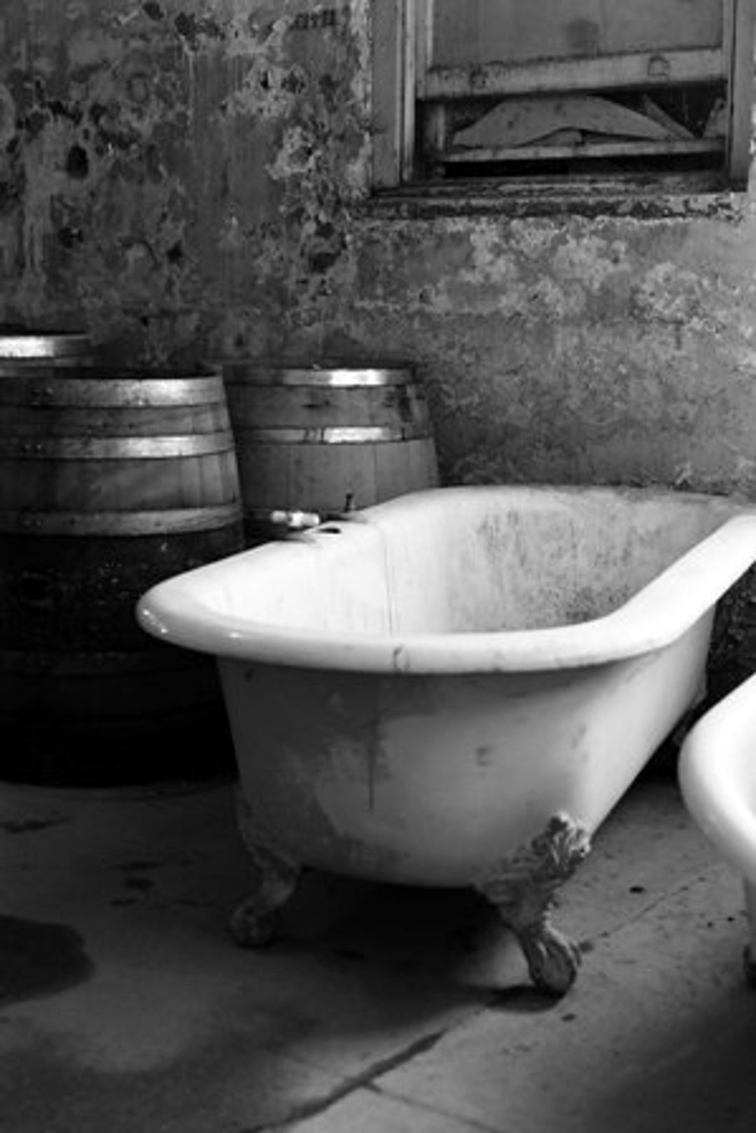 Photograph of the Bath Tub and Wine Barrels in Preston Castle in Ione, California Black and