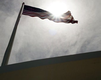 Photograph of the American Flag above the USS Arizona in Pearl Harbor, Hawaii - Color