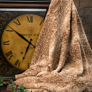 Deer faux fur throw sale