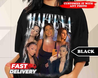 May include: Black t-shirt with a graphic print of four women and the word "MATTEENA" in white letters. The graphic is surrounded by lightning bolts.