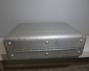 Valise Halliburton , Grand modele, Aluminium, or rosé. Comme neuve