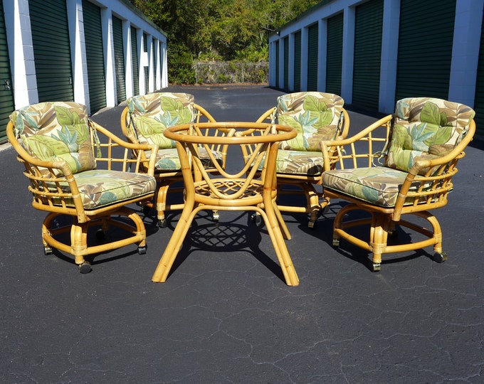 Vintage Rattan Dining Set 4 Swivel Chairs Casters Glass Pedestal Table
