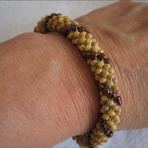 Bracelet jonc en perles de bronze métallisé