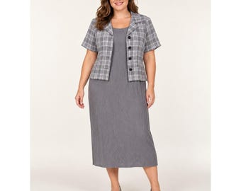 May include: A two-piece set consisting of a solid gray midi-length dress and a short-sleeved jacket. The jacket features a gray and white plaid pattern, a notched collar, and a front button closure with four visible dark buttons.