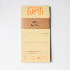 A magnetic shopping list pad designed by Bread & Jam. The shopping list pad can be kept on the fridge door.