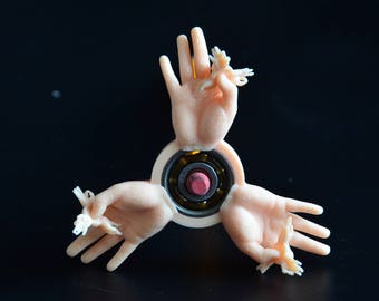 SUPER OK Fingers Fidget Spinner — holding tiny fidget spinners!