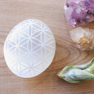 Sacred Geometry Flower of Life etched Selenite meditating palm stone